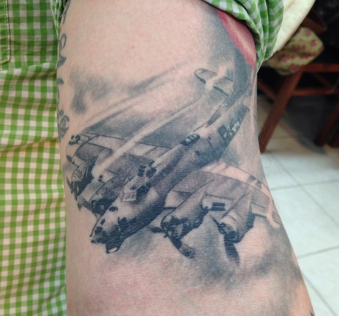 AIGC - image of an F-35 plane tattoo coming out of the wr - Hayo AI tools